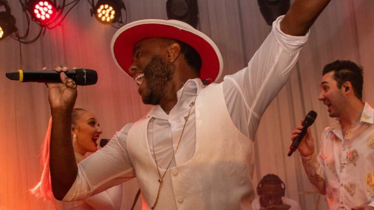 Liquid Blue Wedding Dance Band Vocalist DeShaude